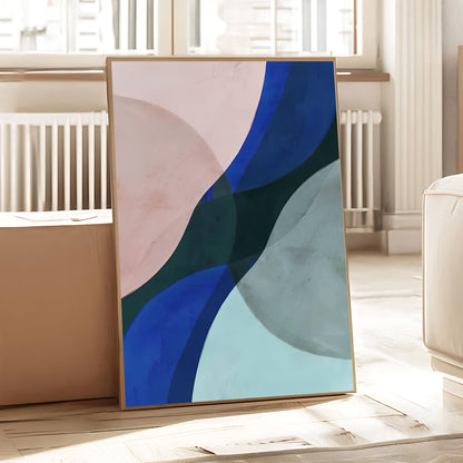 Abstract art piece with blue and green colors in a room setting