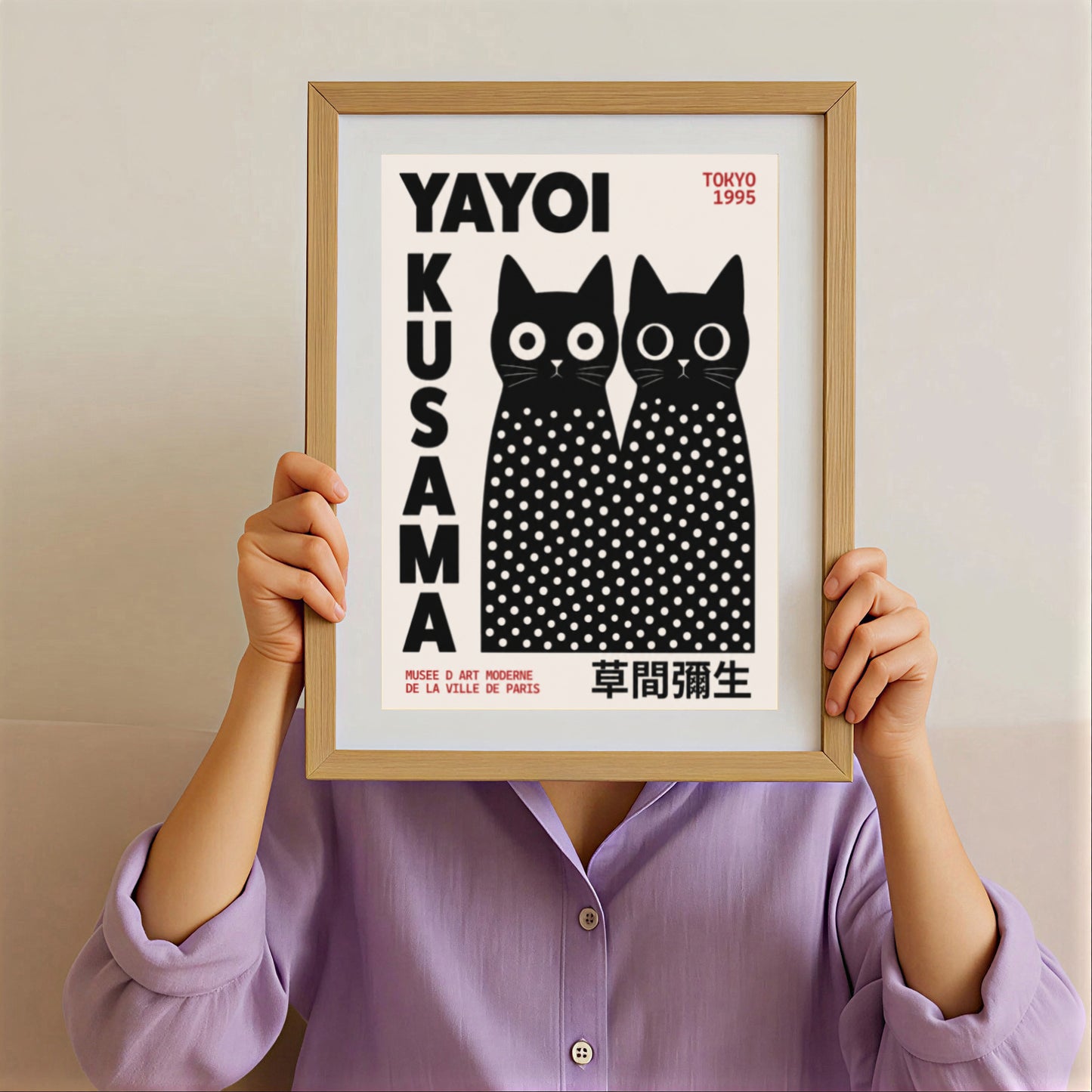 Framed artwork by Yayoi Kusama Inspired Black Cat Poster with white polka dots on a beige background.