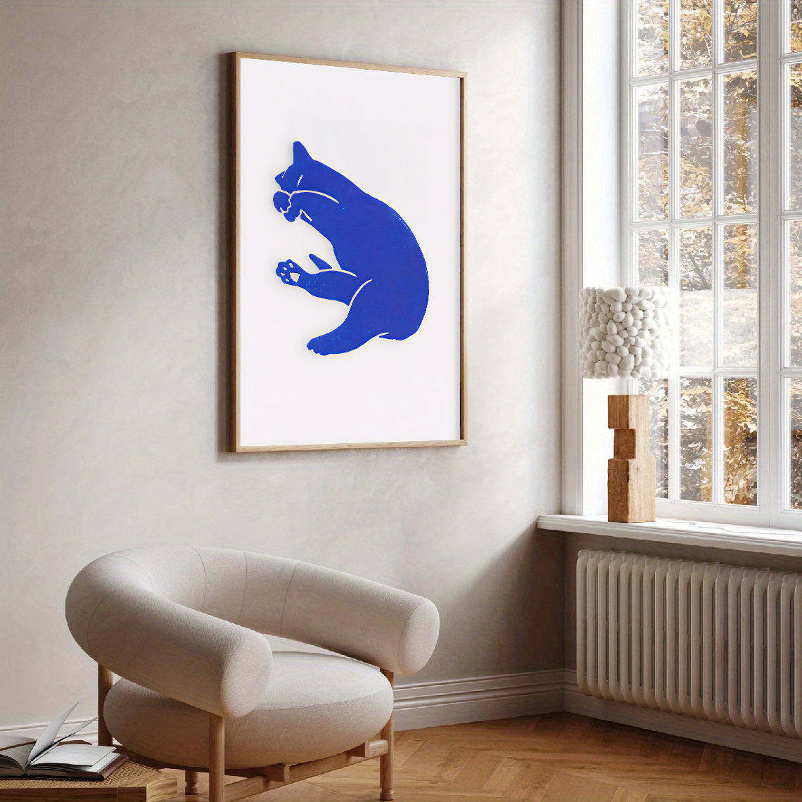 Blue and white modern wall art with minimalist cat design