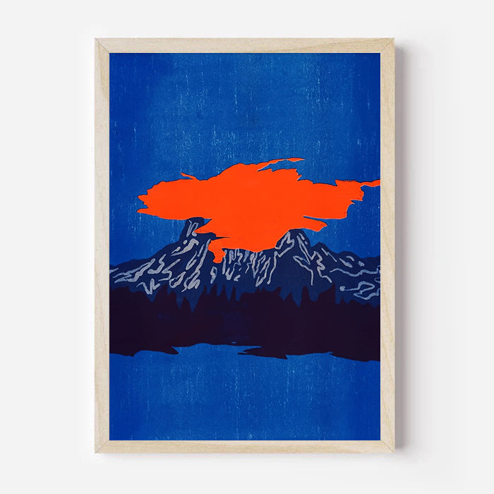 Framed artwork with an orange abstract shape on a blue background