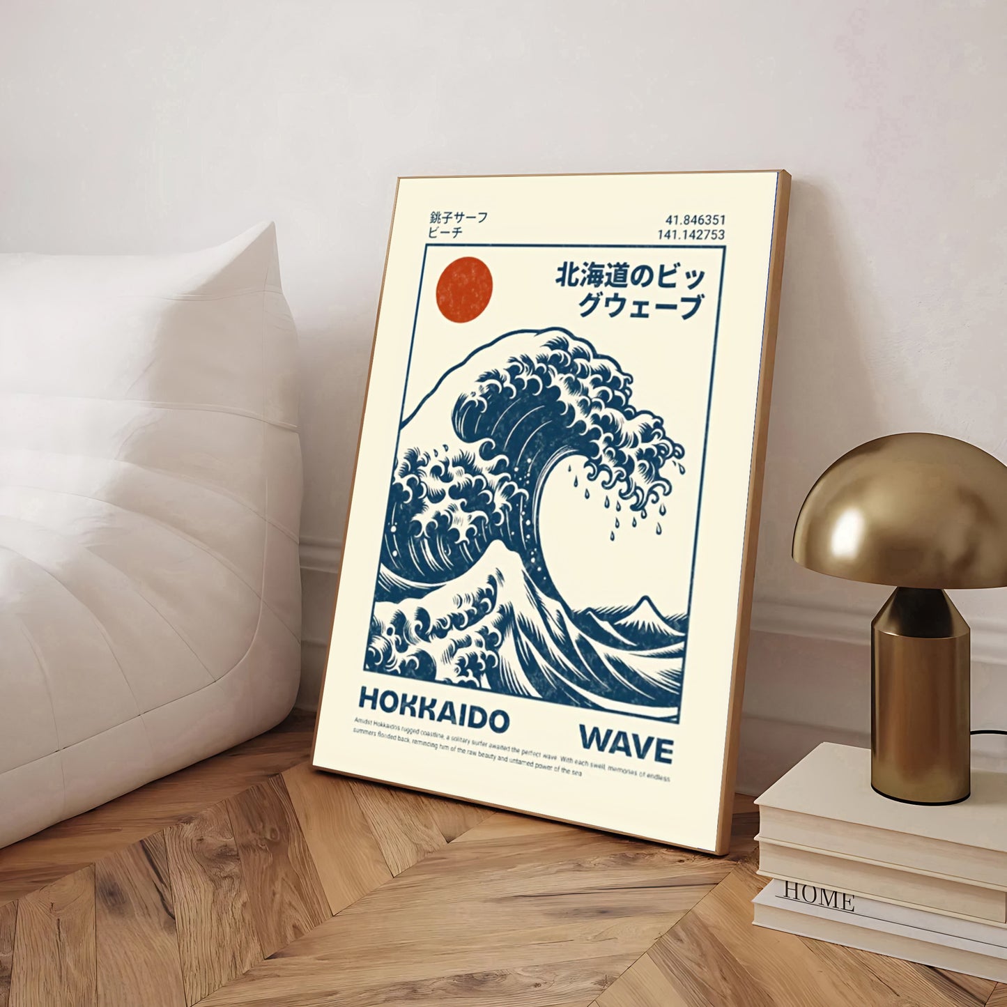 Framed artwork of a Hokusai Wave Poster Print with text on a wooden floor.