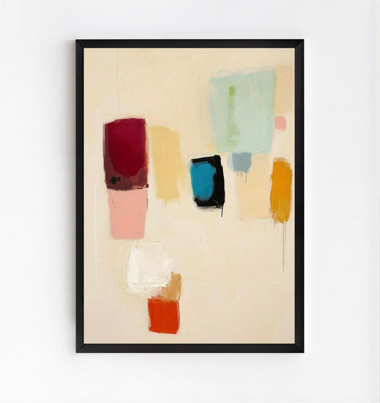 Framed abstract art with colorful blocks on a beige background