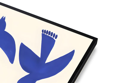Framed artwork with blue abstract birds on a beige background