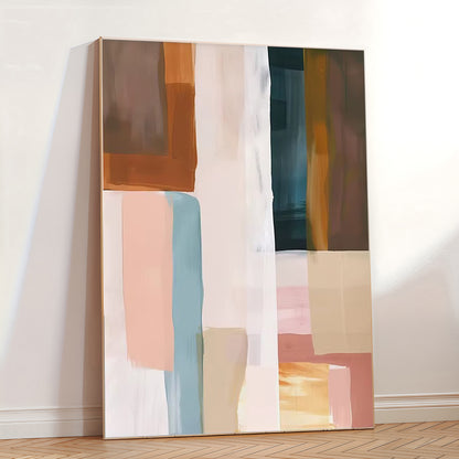 Abstract art piece with colorful geometric shapes on a white wall.