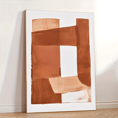 Abstract art piece with brown and beige colors on a white wall.