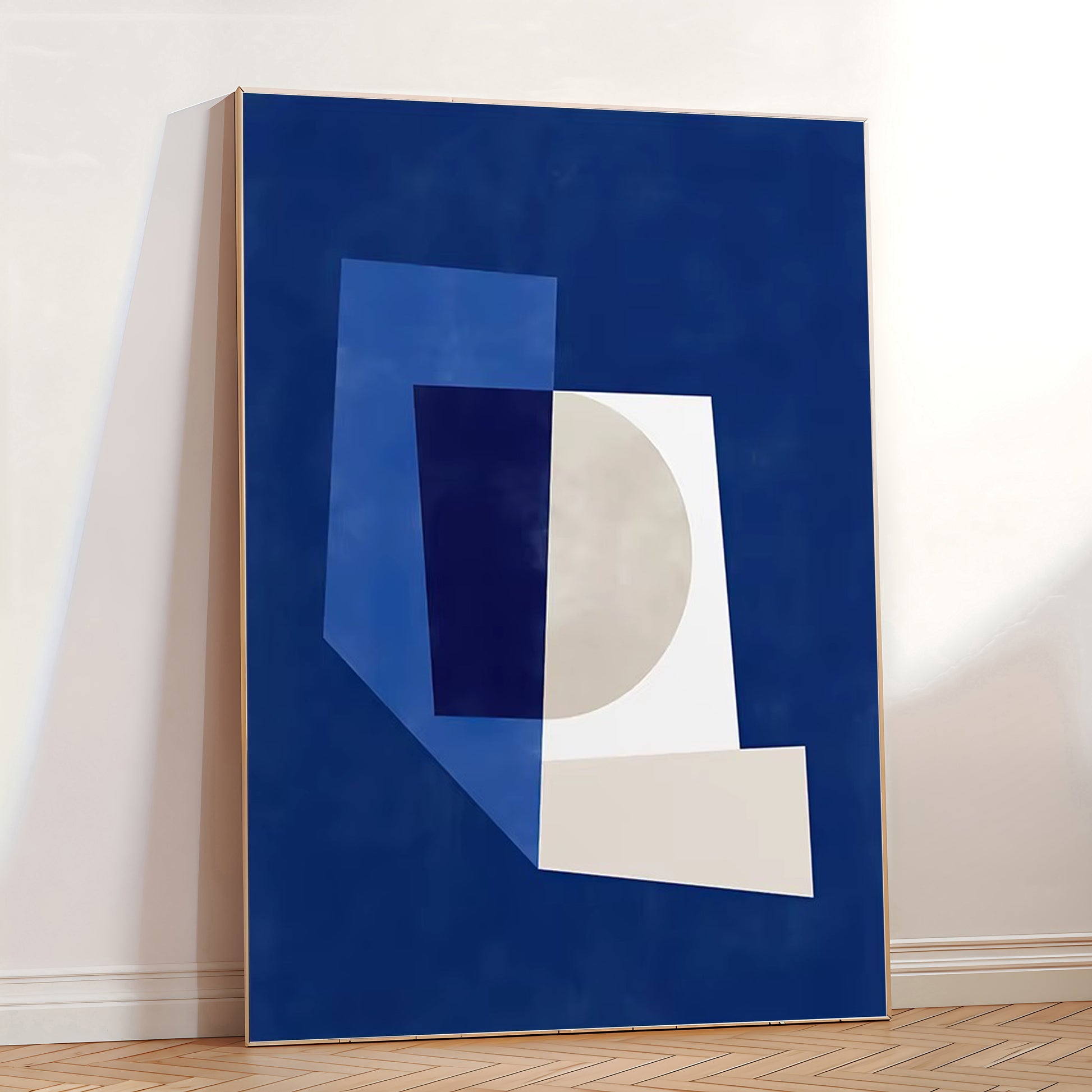 Abstract art piece with geometric shapes on a blue background in a room.