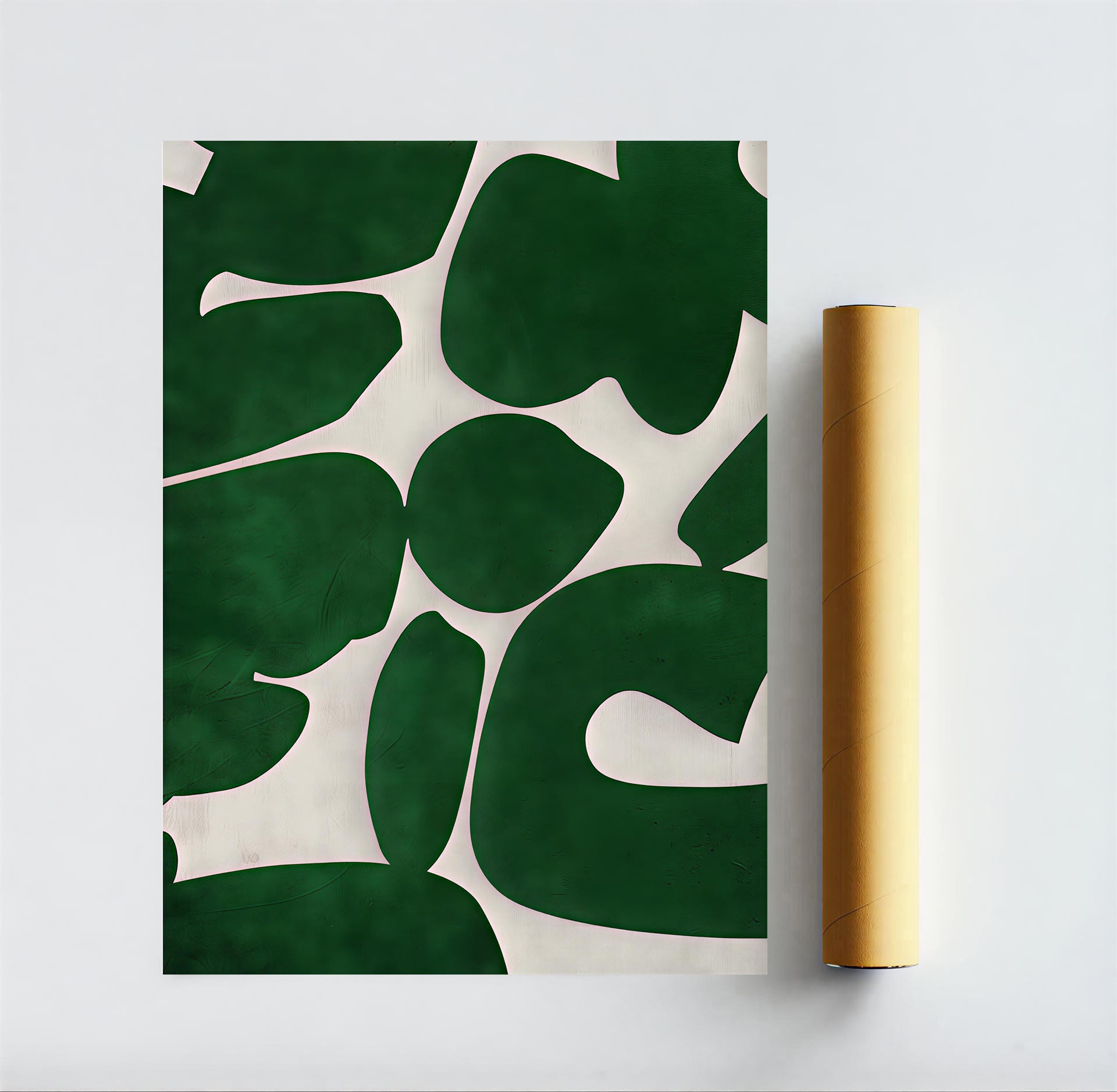 Roll of green and white patterned paper with a gold roll on a light gray background