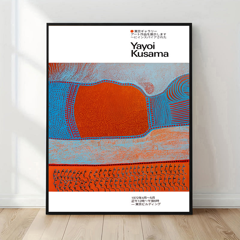 Framed artwork with abstract design and 'Yayoi Kusama' text on a white wall.