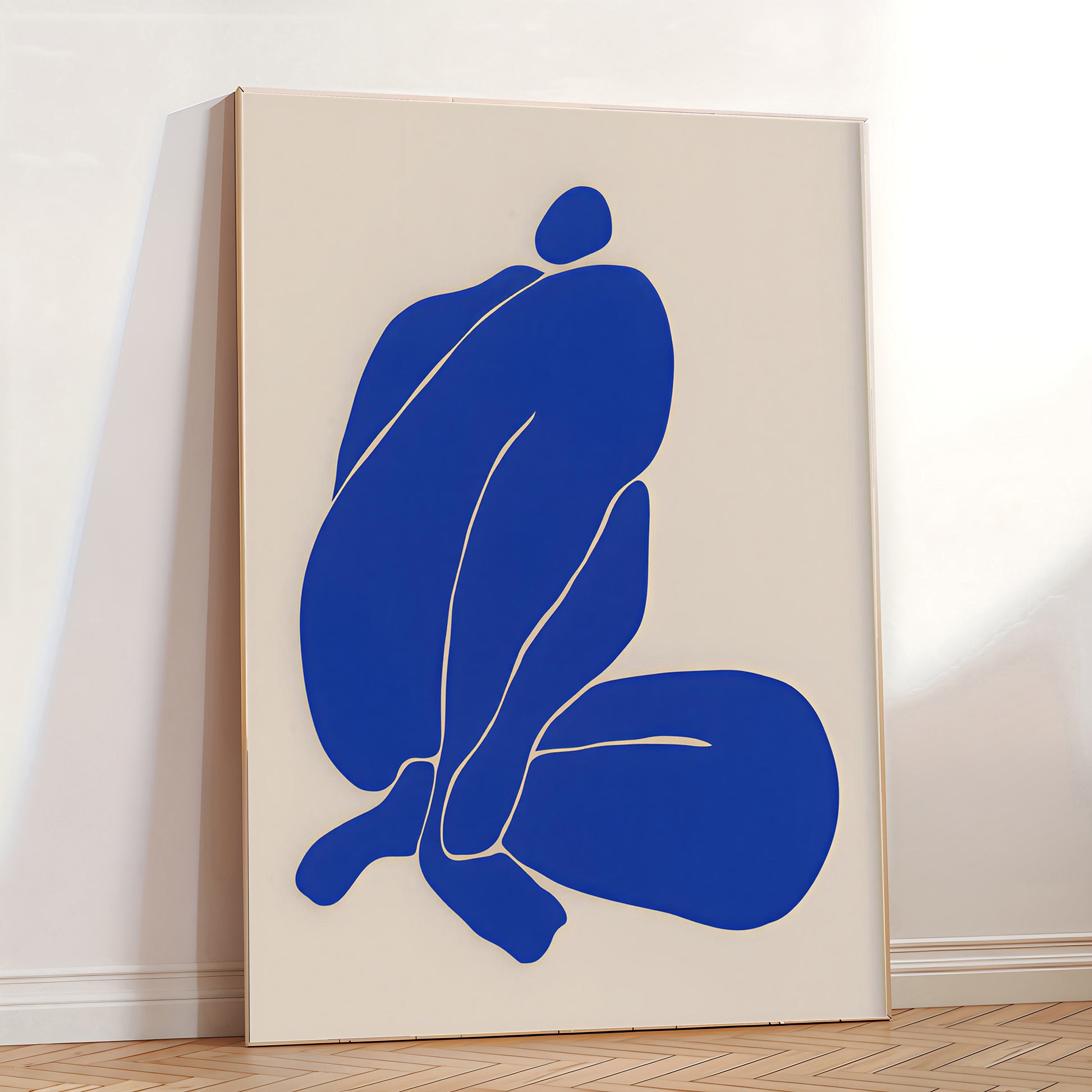 Blue abstract figure on a beige wall