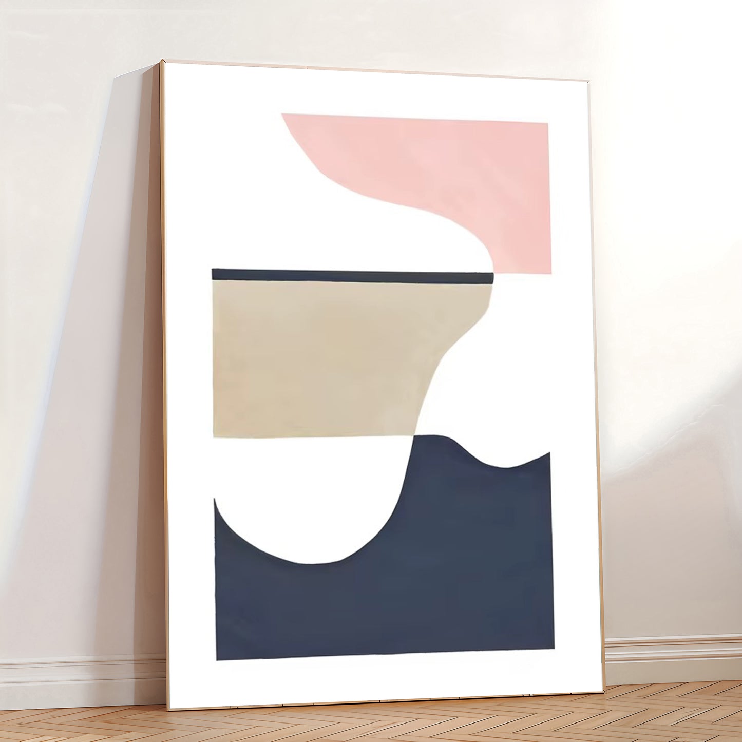 Abstract art print with geometric shapes in pink, beige, and navy on a white wall.