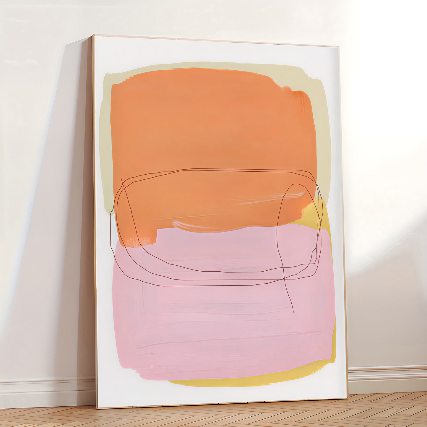 Abstract art print with orange and pink shapes on a white wall.