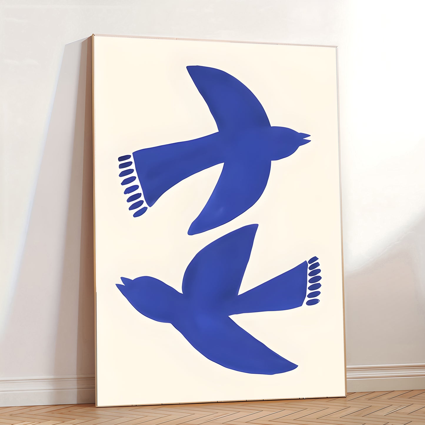 Two blue birds on a white background in a minimalistic room.