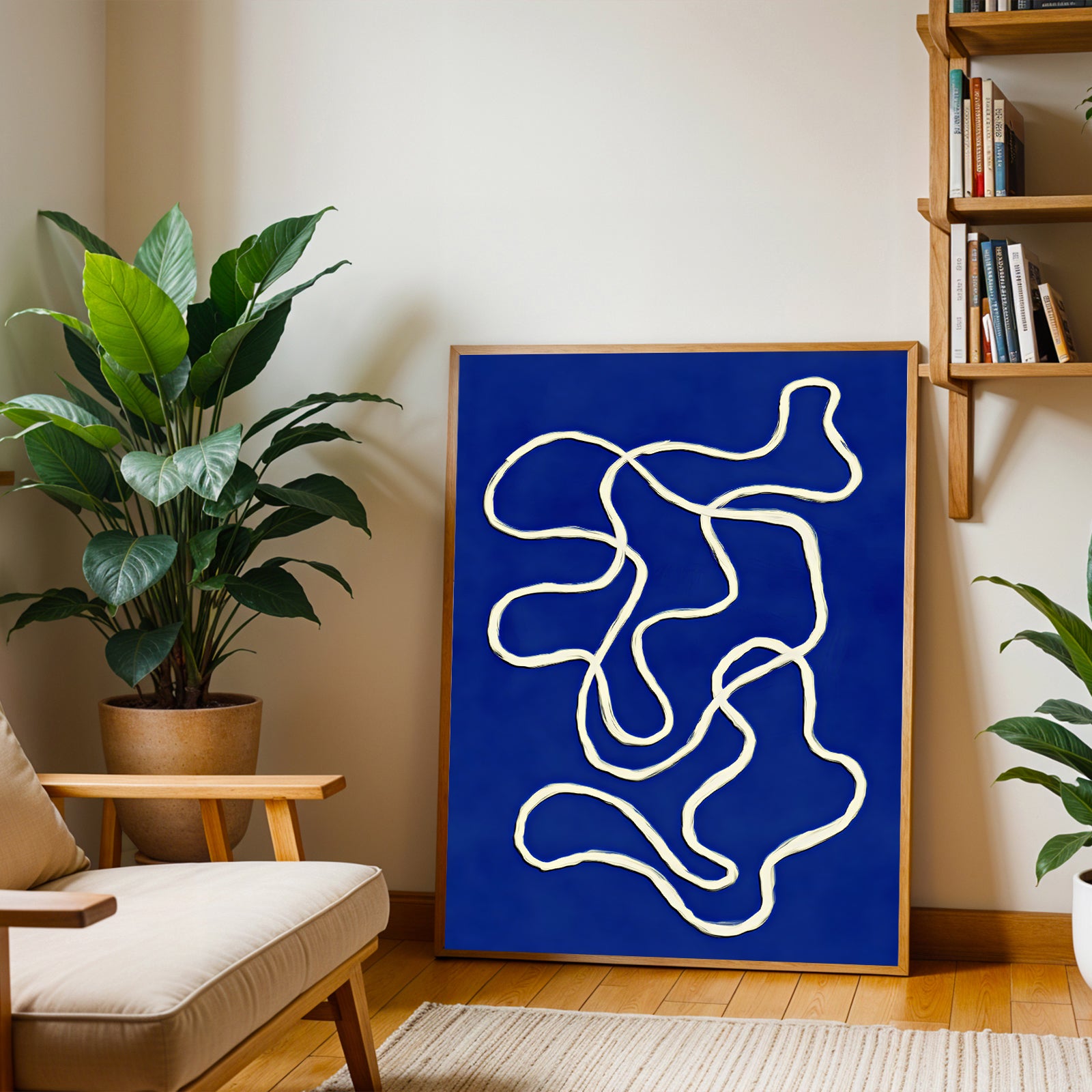 Abstract art piece with white lines on a blue background in a living room setting.