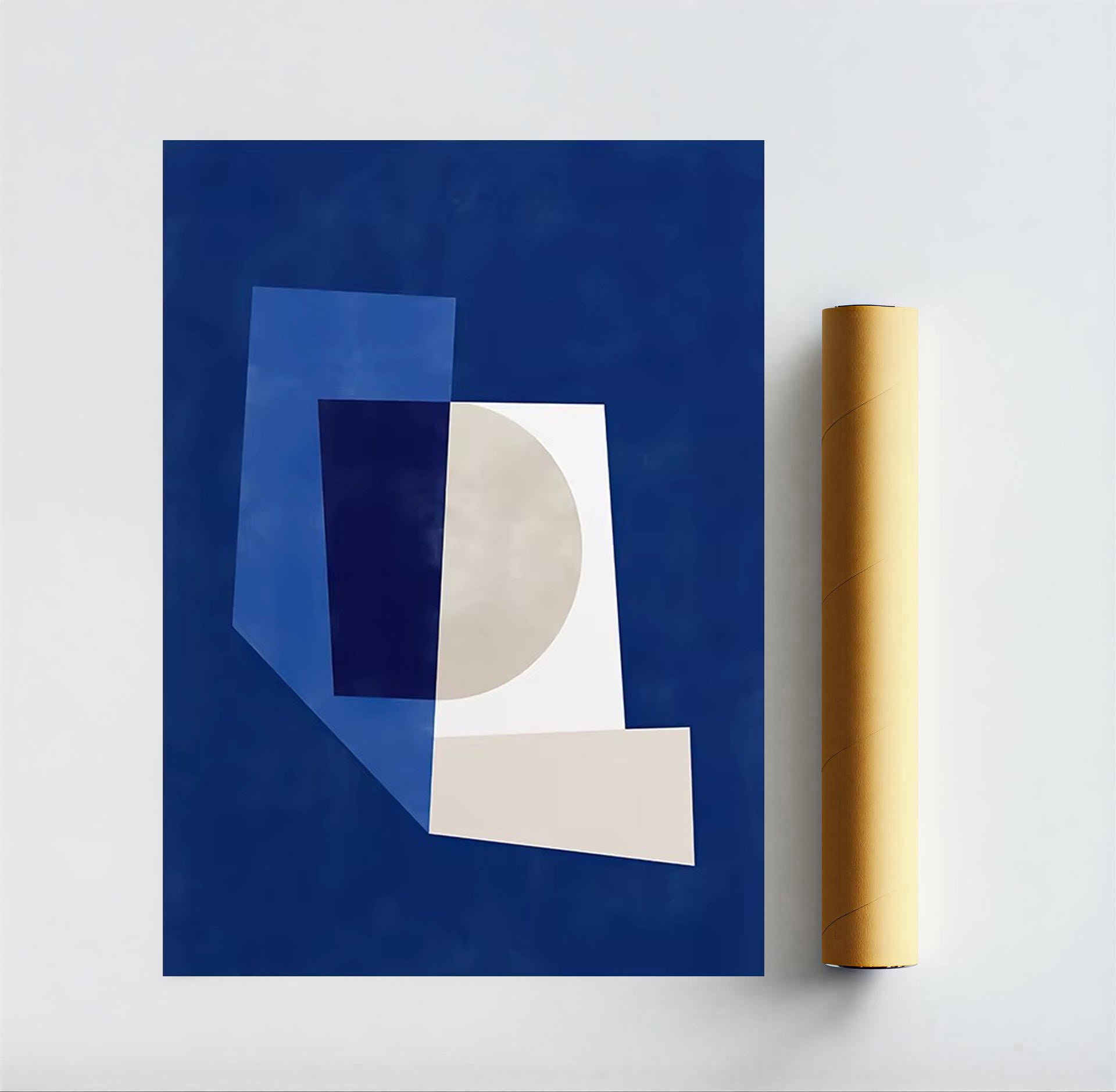 Abstract art print with geometric shapes on a blue background, next to a roll of gold paper.