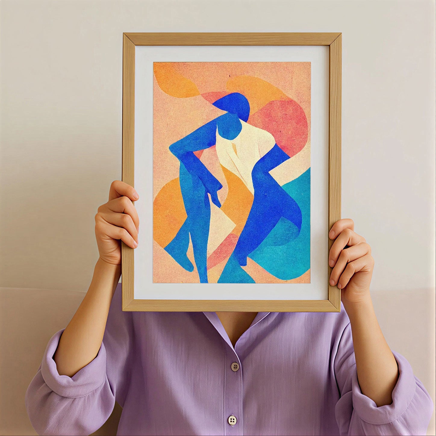 Person holding a framed abstract artwork with colorful figures against a plain background