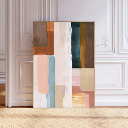 Abstract art piece with geometric shapes on a wall in a room with wooden flooring.