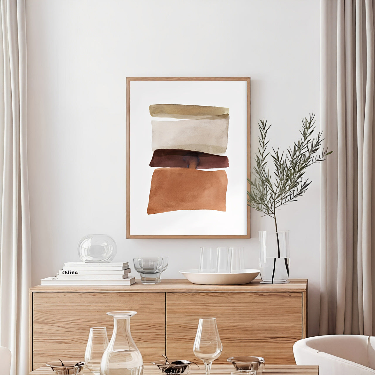 Modern interior with a wooden sideboard, abstract art, and decorative items.