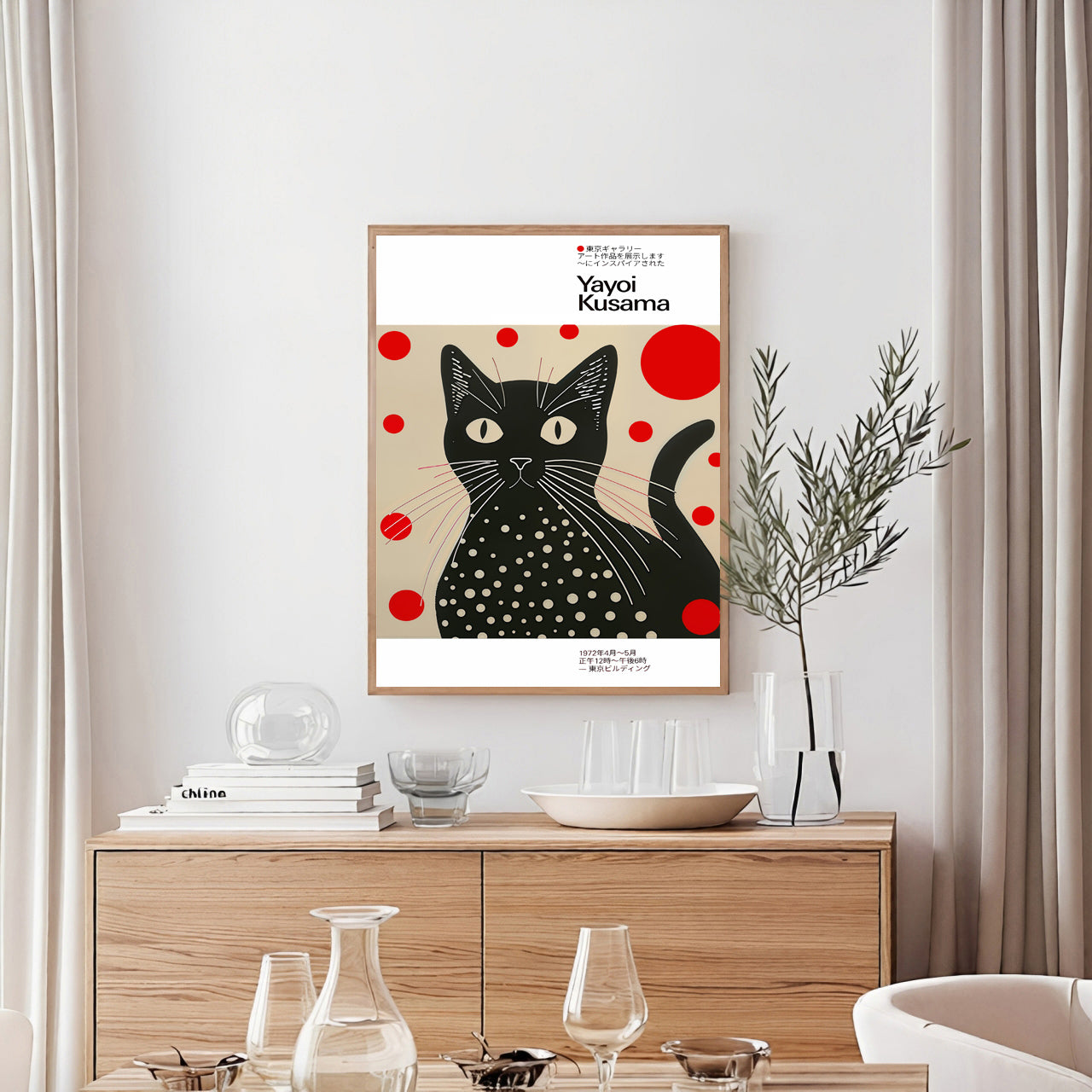 Framed artwork of a black cat with red dots on a beige background in a modern interior setting.