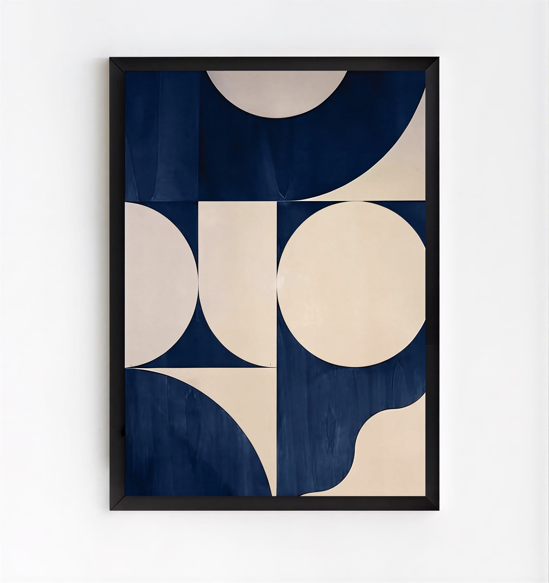 Framed abstract art print with geometric shapes on a white background