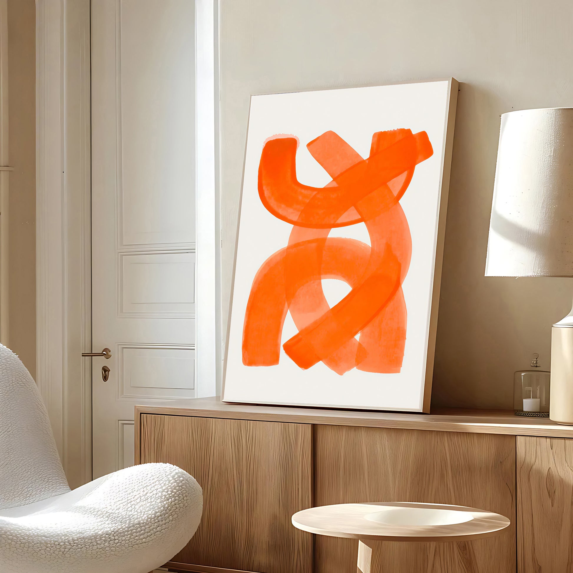 Modern interior with abstract orange artwork on a wall