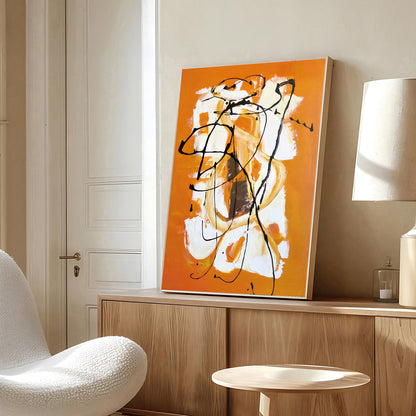 Abstract art piece on a wall in a modern interior setting