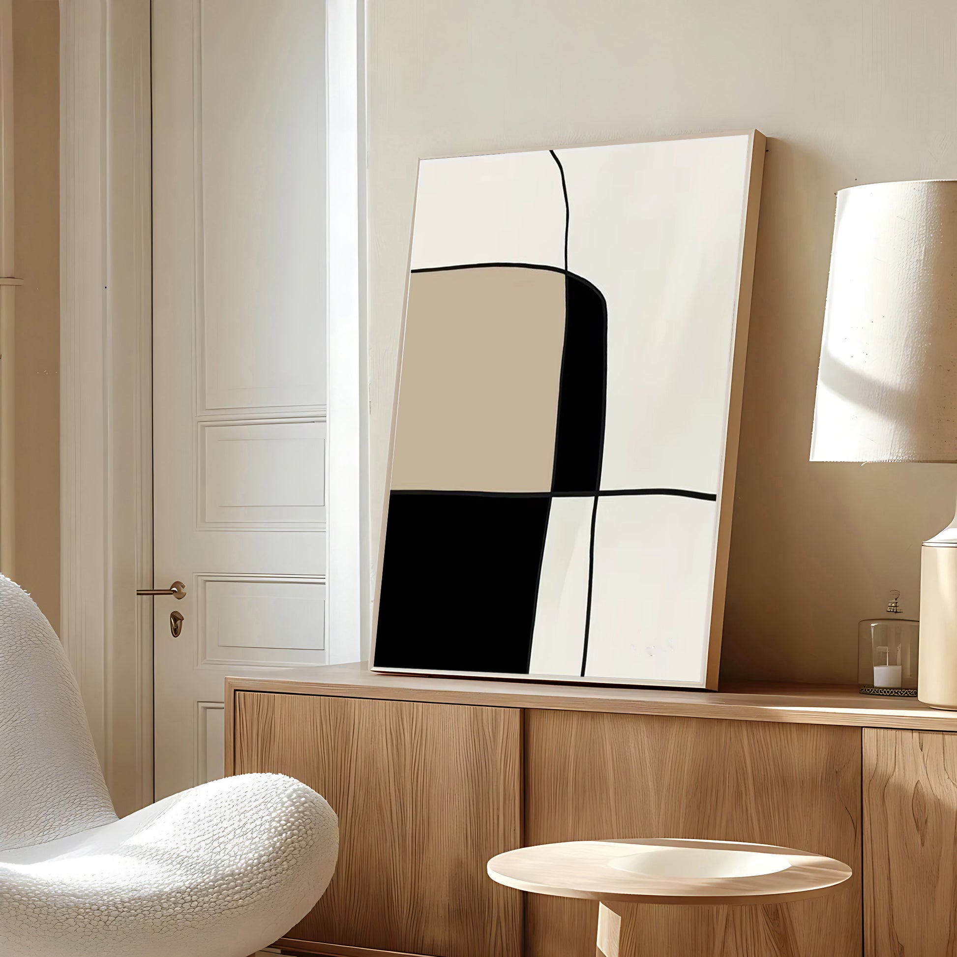 Abstract art piece on a wooden shelf in a room with a chair and lamp.