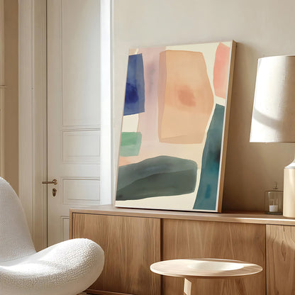 Abstract art piece on a wooden shelf in a room with a chair and lamp.