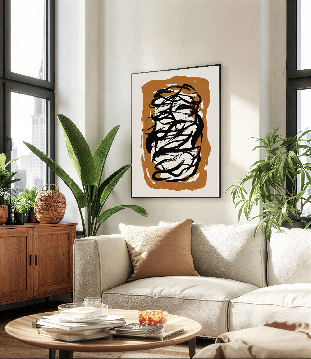 Modern living room with a beige sofa, round wooden coffee table, and abstract art on the wall.