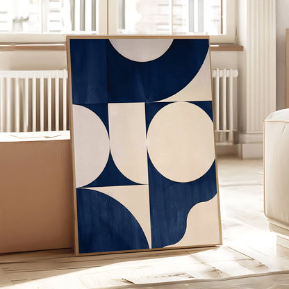 Abstract art print with blue and beige circles in a minimalistic room.