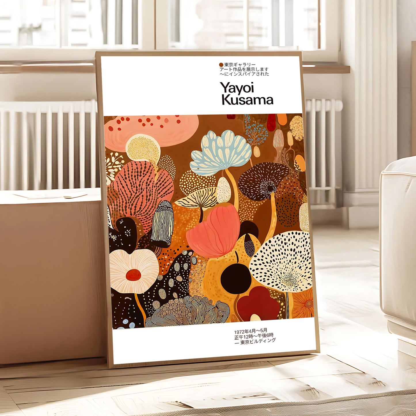 Framed artwork with colorful abstract design and 'Yayoi Kusama' branding in a room setting.