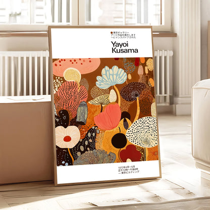 Framed artwork with colorful abstract design and 'Yayoi Kusama' branding in a room setting.