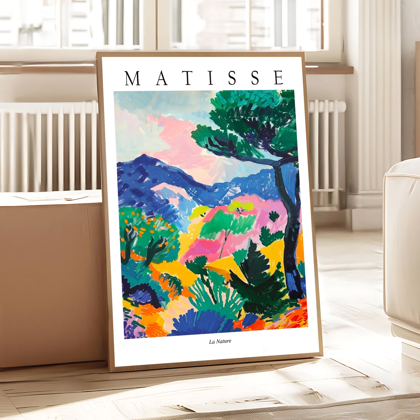 Framed Matisse artwork in a room with light-colored walls and furniture.