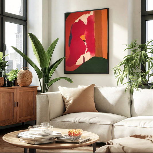 Modern living room with a beige sofa, round wooden coffee table, and abstract art on the wall.