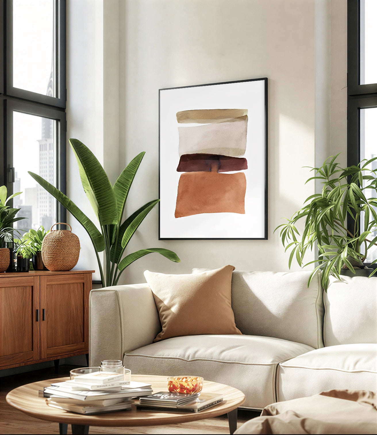 Modern living room with a beige sofa, round wooden coffee table, and abstract art on the wall.