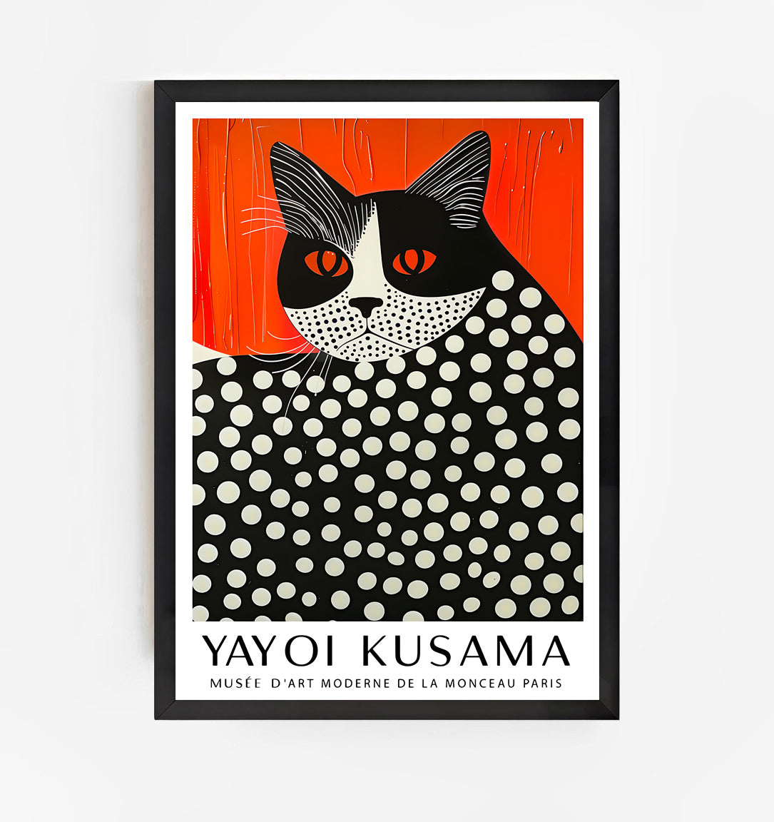 Modern Yayoi Kusama cat art print with black frame on white wall, featuring bold orange background and black-and-white polka dot design, contemporary minimalist wall decor