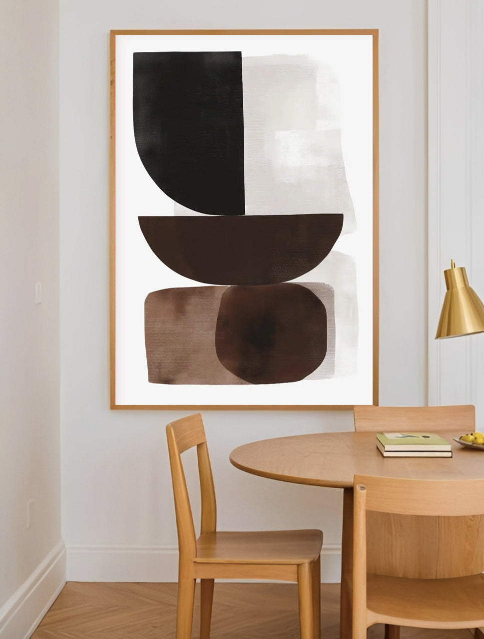Abstract art piece in a modern dining room with wooden table and chairs.