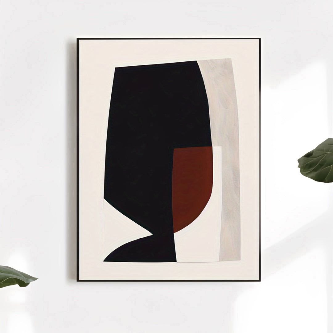 Framed abstract art print with black and brown shapes on a light background