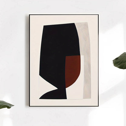 Framed abstract art print with black and brown shapes on a light background